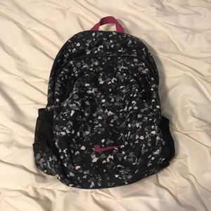 NIKE b&w pink backpack • used but in great shape